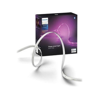 Een Philips Hue ledstrip - wit en gekleurd licht - 3 meter doos van Philips is afgebeeld met een opgerolde strip aan de voorkant. Op de verpakking staat een gloeiend paars effect, het merklogo en de mogelijkheid "16 miljoen kleuren".