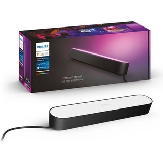 De Philips Hue Play lightbar - RGB (Zwart) van Philips wordt getoond voor zijn kleurrijke doos, met zijn slanke, compacte ontwerp en netsnoer-een perfecte slimme verlichtingsupgrade voor je woonkamer.