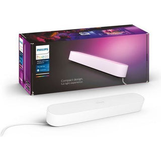De Philips Hue Play lightbar - RGB (Wit) van Philips wordt getoond voor de kleurrijke verpakking en toont het slanke ontwerp en de slimme verlichtingsfuncties voor een levendige lichtervaring.